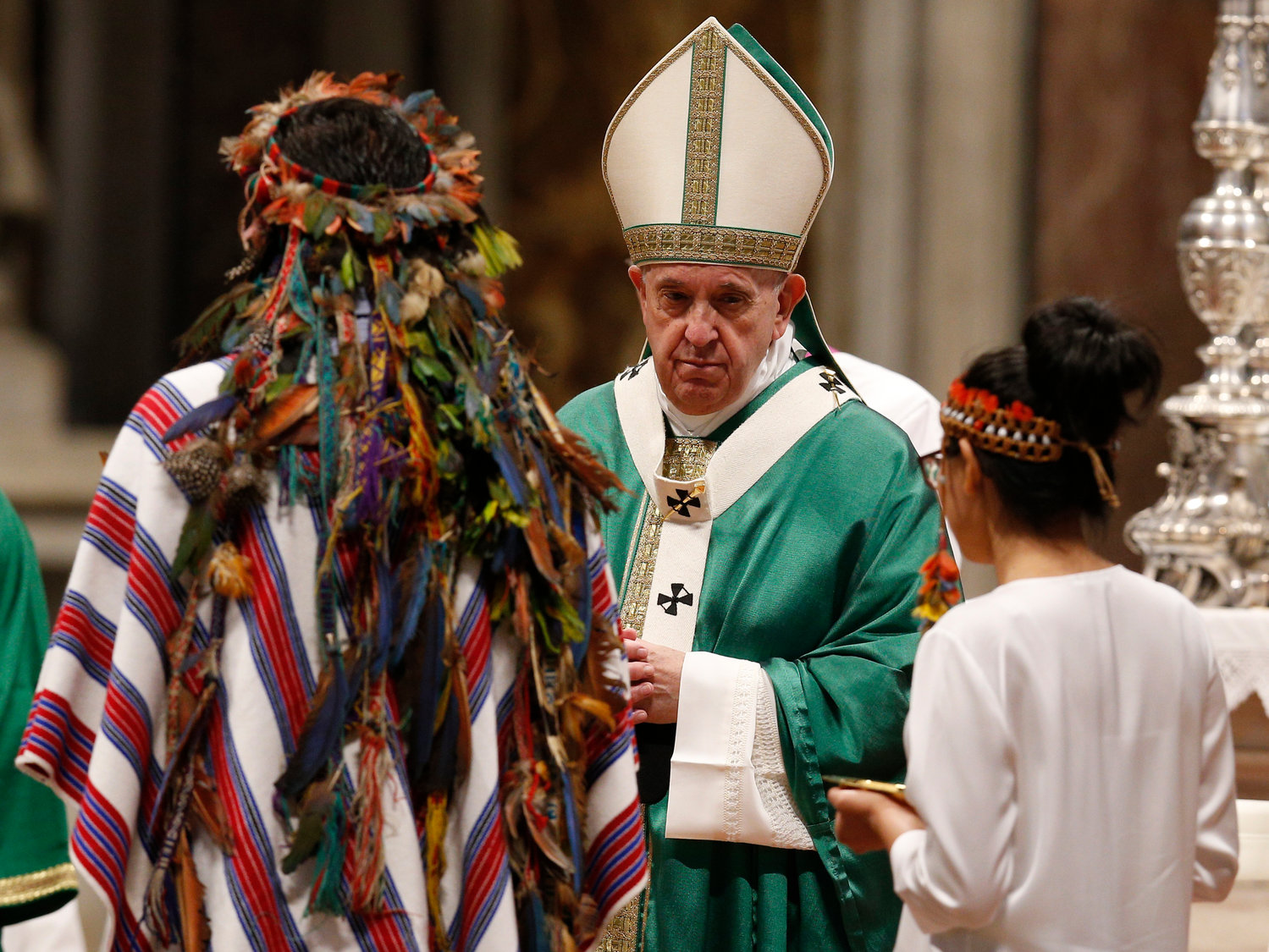 Pope Francis accepts offertory gifts from indigenous people as he celebrates the concluding Mass of the Synod of Bishops for the Amazon at the Vatican in this Oct. 27, 2019, file photo. The Vatican on Feb. 12 released the Pope’s apostolic exhortation, “Querida Amazonia” (Beloved Amazonia), which offers his conclusions from the synod.